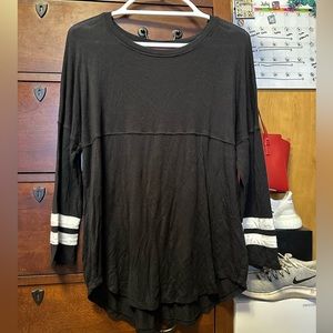 Black 3/4 sleeve, medium shirt.